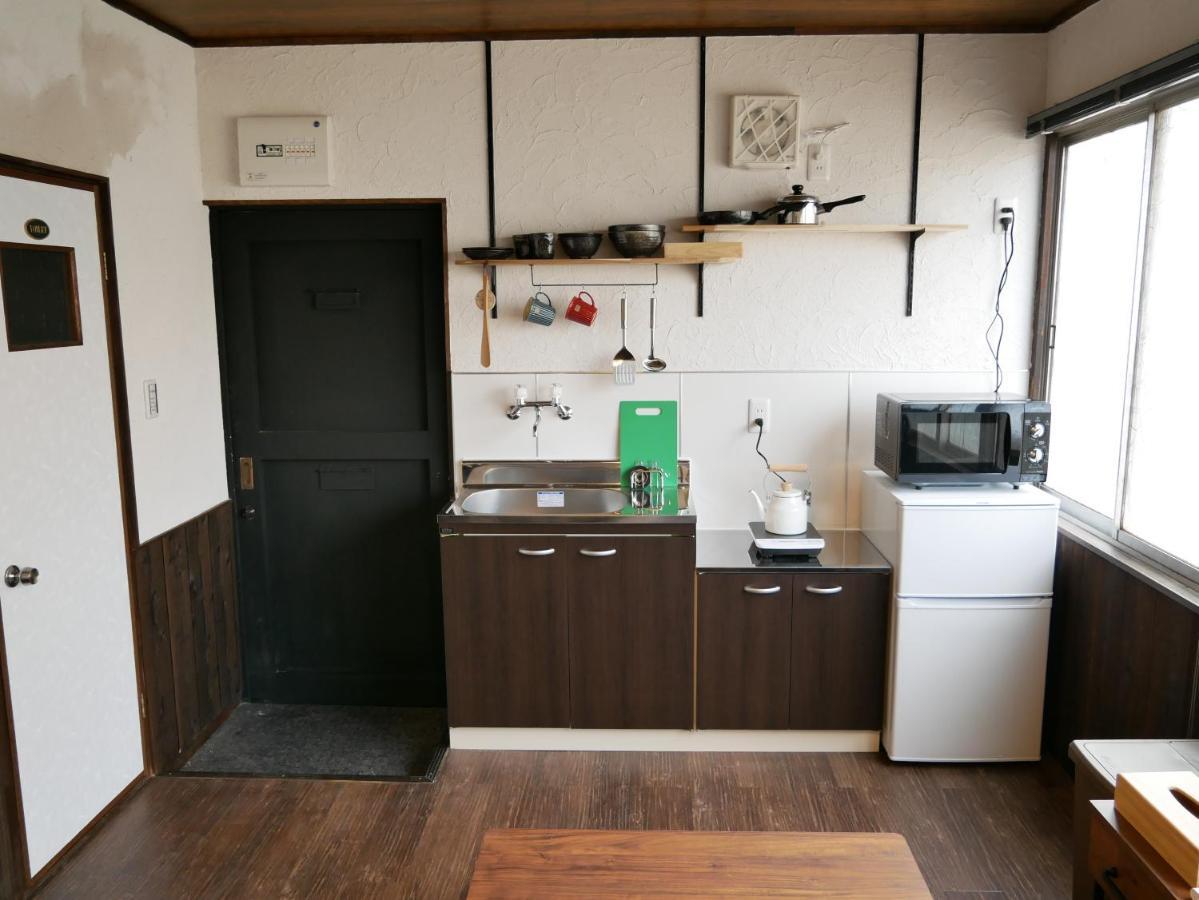 Guest House Kishinosato Osaka Exterior photo